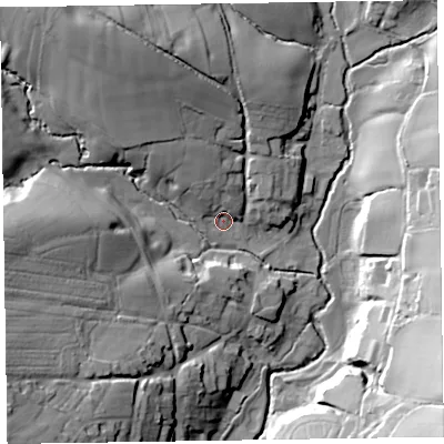 Shaded relief map of the ground around EX100SN, computed from Environment Agency LiDAR. The ground here sits at about 57 m above sea level and falls 43 m across the surrounding 800 m. Surface water reaching this point runs off ground lying to the north-north-west, 10.4 m higher.