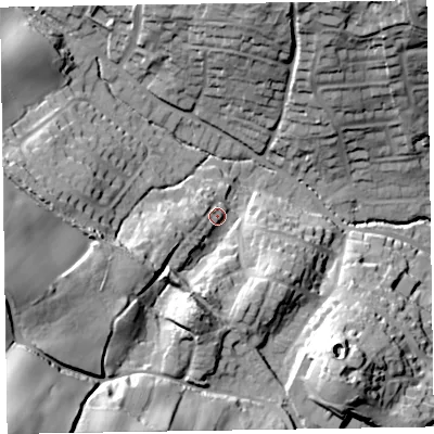 Shaded relief map of the ground around EX109DS, computed from Environment Agency LiDAR. The ground here sits at about 52 m above sea level and falls 69 m across the surrounding 800 m. Surface water reaching this point runs off ground lying to the west-south-west, 34.3 m higher.