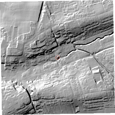 Shaded relief map of the ground around EX111HQ, computed from Environment Agency LiDAR. The ground here sits at about 57 m above sea level and falls 33 m across the surrounding 800 m. Surface water reaching this point runs off ground lying to the south-east, 28.8 m higher.