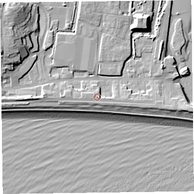 Shaded relief map of the ground around EX122GB, computed from Environment Agency LiDAR. The ground here sits at about 6 m above sea level and falls 16 m across the surrounding 800 m. Surface water reaching this point runs off ground lying to the west, 1.0 m higher.