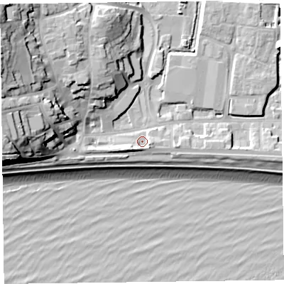 Shaded relief map of the ground around EX122LT, computed from Environment Agency LiDAR. The ground here sits at about 4 m above sea level and falls 28 m across the surrounding 800 m. Surface water reaching this point runs off ground lying to the south-south-west, 3.9 m higher.