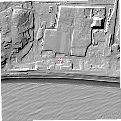 Shaded relief map of the ground around EX122NA, computed from Environment Agency LiDAR. The ground here sits at about 3 m above sea level and falls 18 m across the surrounding 800 m. Surface water reaching this point runs off ground lying to the west-south-west, 5.4 m higher.