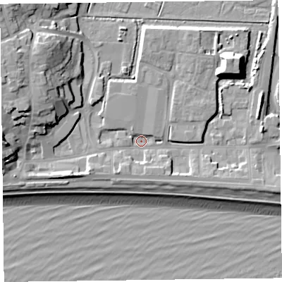 Shaded relief map of the ground around EX122NB, computed from Environment Agency LiDAR. The ground here sits at about 2 m above sea level and falls 18 m across the surrounding 800 m. Surface water reaching this point runs off ground lying to the north, 3.6 m higher.