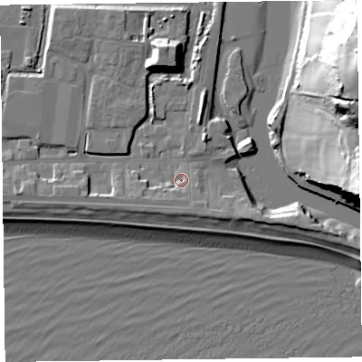 Shaded relief map of the ground around EX122NN, computed from Environment Agency LiDAR. The ground here sits at about 3 m above sea level and falls 46 m across the surrounding 800 m. Surface water reaching this point runs off ground lying to the west, 3.2 m higher.
