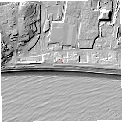 Shaded relief map of the ground around EX122NP, computed from Environment Agency LiDAR. The ground here sits at about 6 m above sea level and falls 19 m across the surrounding 800 m. Surface water reaching this point runs off ground lying to the west, 1.0 m higher.