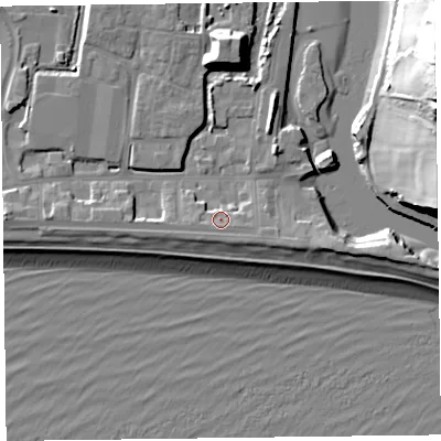 Shaded relief map of the ground around EX122NW, computed from Environment Agency LiDAR. The ground here sits at about 5 m above sea level and falls 36 m across the surrounding 800 m. Surface water reaching this point runs off ground lying to the west, 1.0 m higher.