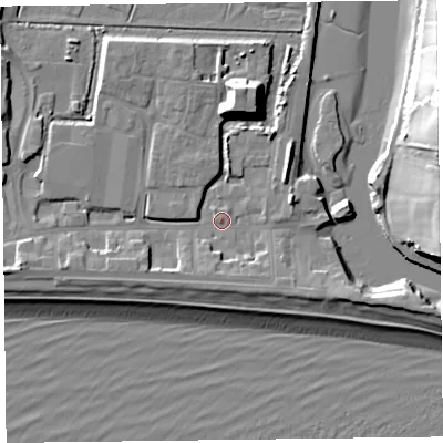 Shaded relief map of the ground around EX122XJ, computed from Environment Agency LiDAR. The ground here sits at about 3 m above sea level and falls 25 m across the surrounding 800 m. Surface water reaching this point runs off ground lying to the north-east, 5.5 m higher.