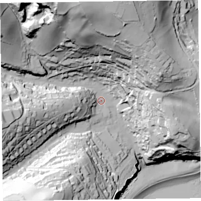 Shaded relief map of the ground around EX123JJ, computed from Environment Agency LiDAR. The ground here sits at about 26 m above sea level and falls 111 m across the surrounding 800 m. Surface water reaching this point runs off ground lying to the north, 83.3 m higher.