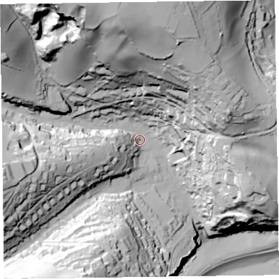 Shaded relief map of the ground around EX123JL, computed from Environment Agency LiDAR. The ground here sits at about 27 m above sea level and falls 113 m across the surrounding 800 m. Surface water reaching this point runs off ground lying to the north, 84.2 m higher.
