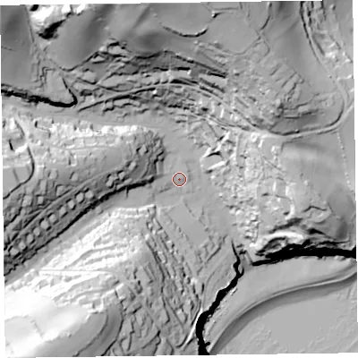 Shaded relief map of the ground around EX123ND, computed from Environment Agency LiDAR. The ground here sits at about 26 m above sea level and falls 106 m across the surrounding 800 m. Surface water reaching this point runs off ground lying to the west-north-west, 25.9 m higher.