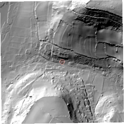 Shaded relief map of the ground around EX124AP, computed from Environment Agency LiDAR. The ground here sits at about 13 m above sea level and falls 132 m across the surrounding 800 m. Surface water reaching this point runs off ground lying to the north-east, 122.0 m higher.