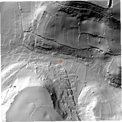 Shaded relief map of the ground around EX124BS, computed from Environment Agency LiDAR. The ground here sits at about 15 m above sea level and falls 133 m across the surrounding 800 m. Surface water reaching this point runs off ground lying to the north-east, 122.0 m higher.