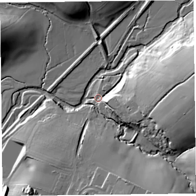 Shaded relief map of the ground around EX137LH, computed from Environment Agency LiDAR. The ground here sits at about 33 m above sea level and falls 37 m across the surrounding 800 m. Surface water reaching this point runs off ground lying to the east, 28.0 m higher.