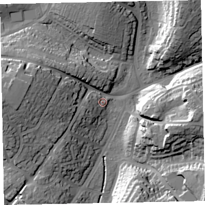 Shaded relief map of the ground around EX13DD, computed from Environment Agency LiDAR. The ground here sits at about 20 m above sea level and falls 33 m across the surrounding 800 m. Surface water reaching this point runs off ground lying to the west, 7.6 m higher.