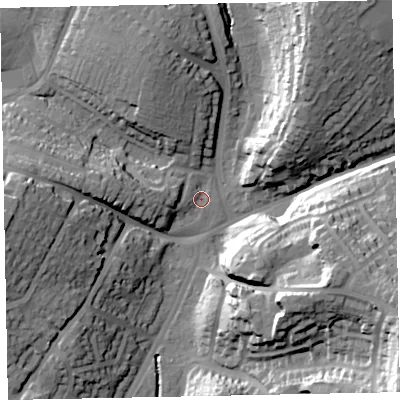 Shaded relief map of the ground around EX13DE, computed from Environment Agency LiDAR. The ground here sits at about 17 m above sea level and falls 38 m across the surrounding 800 m. Surface water reaching this point runs off ground lying to the west, 2.5 m higher.