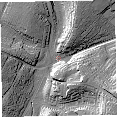 Shaded relief map of the ground around EX13EA, computed from Environment Agency LiDAR. The ground here sits at about 17 m above sea level and falls 43 m across the surrounding 800 m. Surface water reaching this point runs off ground lying to the south-east, 38.9 m higher.