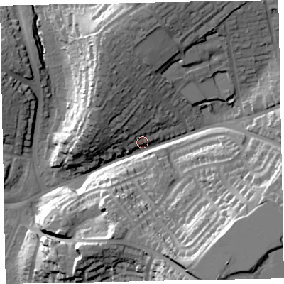 Shaded relief map of the ground around EX13ED, computed from Environment Agency LiDAR. The ground here sits at about 25 m above sea level and falls 40 m across the surrounding 800 m. Surface water reaching this point runs off ground lying to the north, 28.1 m higher.
