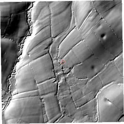 Shaded relief map of the ground around EX143EH, computed from Environment Agency LiDAR. The ground here sits at about 69 m above sea level and falls 29 m across the surrounding 800 m. Surface water reaching this point runs off ground lying to the north-north-east, 22.5 m higher.