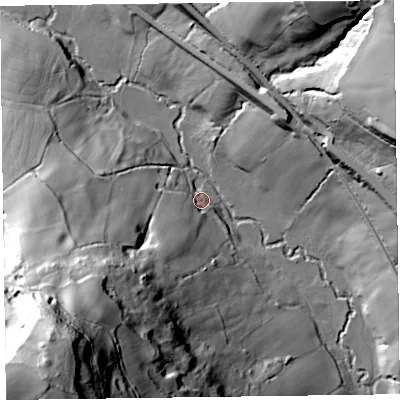 Shaded relief map of the ground around EX149JT, computed from Environment Agency LiDAR. The ground here sits at about 69 m above sea level and falls 117 m across the surrounding 800 m. Surface water reaching this point runs off ground lying to the south-west, 70.8 m higher.