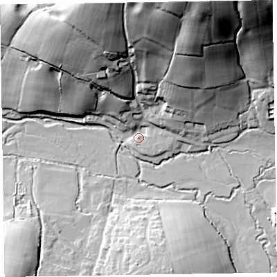 Shaded relief map of the ground around EX153TZ, computed from Environment Agency LiDAR. The ground here sits at about 124 m above sea level and falls 57 m across the surrounding 800 m. Surface water reaching this point runs off ground lying to the north-north-east, 53.0 m higher.