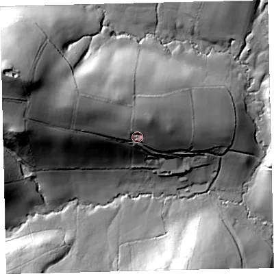 Shaded relief map of the ground around EX174RP, computed from Environment Agency LiDAR. The ground here sits at about 121 m above sea level and falls 71 m across the surrounding 800 m. Surface water reaching this point runs off ground lying to the north-north-west, 10.6 m higher.
