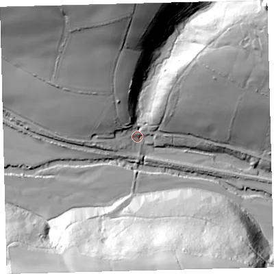 Shaded relief map of the ground around EX187LF, computed from Environment Agency LiDAR. The ground here sits at about 69 m above sea level and falls 62 m across the surrounding 800 m. Surface water reaching this point runs off ground lying to the north, 53.8 m higher.