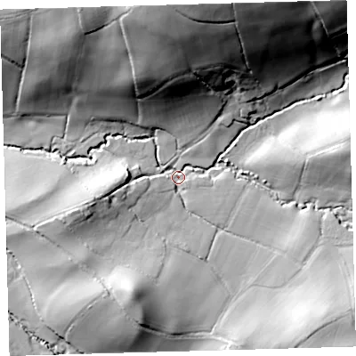 Shaded relief map of the ground around EX198RZ, computed from Environment Agency LiDAR. The ground here sits at about 74 m above sea level and falls 44 m across the surrounding 800 m. Surface water reaching this point runs off ground lying to the north-north-east, 41.4 m higher.