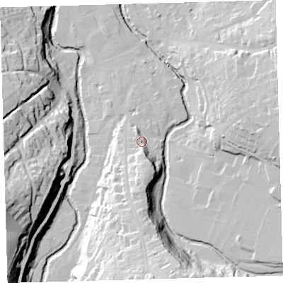 Shaded relief map of the ground around EX201DX, computed from Environment Agency LiDAR. The ground here sits at about 161 m above sea level and falls 55 m across the surrounding 800 m. Surface water reaching this point runs off ground lying to the south, 12.0 m higher.
