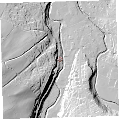Shaded relief map of the ground around EX201JE, computed from Environment Agency LiDAR. The ground here sits at about 156 m above sea level and falls 69 m across the surrounding 800 m. Surface water reaching this point runs off ground lying to the south-west, 62.4 m higher.