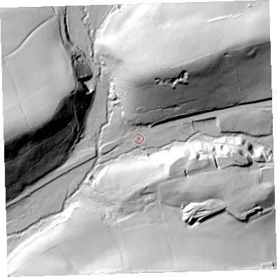 Shaded relief map of the ground around EX204EE, computed from Environment Agency LiDAR. The ground here sits at about 124 m above sea level and falls 69 m across the surrounding 800 m. Surface water reaching this point runs off ground lying to the north-north-east, 51.4 m higher.
