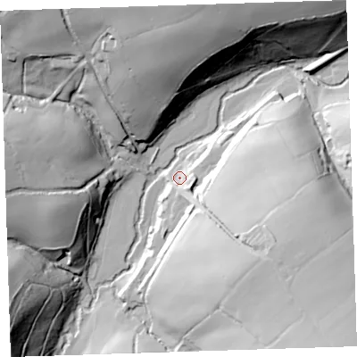 Shaded relief map of the ground around EX215HA, computed from Environment Agency LiDAR. The ground here sits at about 112 m above sea level and falls 56 m across the surrounding 800 m. Surface water reaching this point runs off ground lying to the south-east, 42.8 m higher.