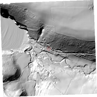 Shaded relief map of the ground around EX230JG, computed from Environment Agency LiDAR. The ground here sits at about 20 m above sea level and falls 133 m across the surrounding 800 m. Surface water reaching this point runs off ground lying to the north-east, 116.5 m higher.