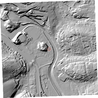 Shaded relief map of the ground around EX238LB, computed from Environment Agency LiDAR. The ground here sits at about 5 m above sea level and falls 29 m across the surrounding 800 m. Surface water reaching this point runs off ground lying to the west, 7.4 m higher.