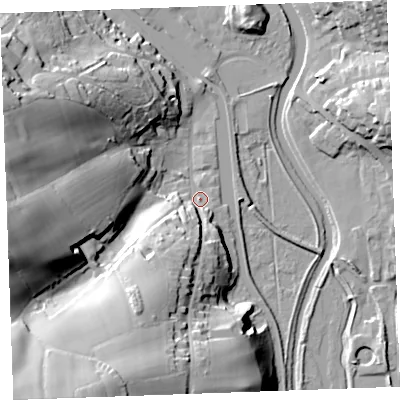 Shaded relief map of the ground around EX238LW, computed from Environment Agency LiDAR. The ground here sits at about 7 m above sea level and falls 39 m across the surrounding 800 m. Surface water reaching this point runs off ground lying to the south-south-west, 32.5 m higher.