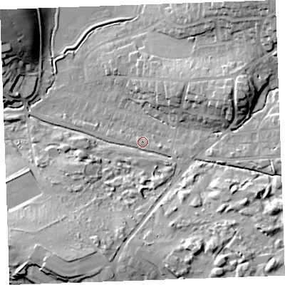 Shaded relief map of the ground around EX238RF, computed from Environment Agency LiDAR. The ground here sits at about 11 m above sea level and falls 26 m across the surrounding 800 m. Surface water reaching this point runs off ground lying to the south-east, 18.9 m higher.