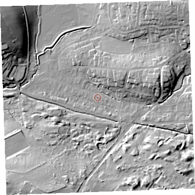 Shaded relief map of the ground around EX238RJ, computed from Environment Agency LiDAR. The ground here sits at about 11 m above sea level and falls 27 m across the surrounding 800 m. Surface water reaching this point runs off ground lying to the north-east, 10.4 m higher.