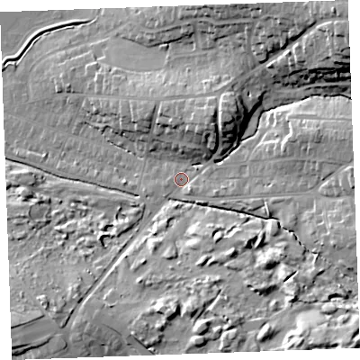 Shaded relief map of the ground around EX238RS, computed from Environment Agency LiDAR. The ground here sits at about 13 m above sea level and falls 32 m across the surrounding 800 m. Surface water reaching this point runs off ground lying to the north-east, 26.7 m higher.