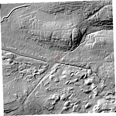 Shaded relief map of the ground around EX238RT, computed from Environment Agency LiDAR. The ground here sits at about 13 m above sea level and falls 32 m across the surrounding 800 m. Surface water reaching this point runs off ground lying to the north-east, 26.7 m higher.