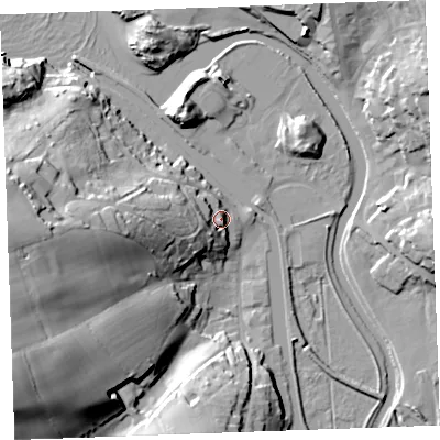 Shaded relief map of the ground around EX238SD, computed from Environment Agency LiDAR. The ground here sits at about 12 m above sea level and falls 43 m across the surrounding 800 m. Surface water reaching this point runs off ground lying to the west, 21.7 m higher.