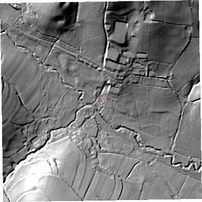 Shaded relief map of the ground around EX246ED, computed from Environment Agency LiDAR. The ground here sits at about 79 m above sea level and falls 52 m across the surrounding 800 m. Surface water reaching this point runs off ground lying to the north-north-east, 12.9 m higher.