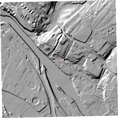 Shaded relief map of the ground around EX24DW, computed from Environment Agency LiDAR. The ground here sits at about 9 m above sea level and falls 36 m across the surrounding 800 m. Surface water reaching this point runs off ground lying to the north, 20.3 m higher.