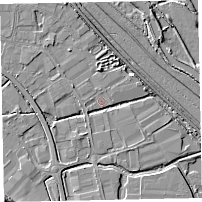 Shaded relief map of the ground around EX28GN, computed from Environment Agency LiDAR. The ground here sits at about 4 m above sea level and falls 19 m across the surrounding 800 m. Surface water reaching this point runs off ground lying to the north, 4.3 m higher.