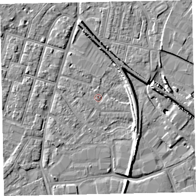 Shaded relief map of the ground around EX28JL, computed from Environment Agency LiDAR. The ground here sits at about 7 m above sea level and falls 11 m across the surrounding 800 m. Surface water reaching this point runs off ground lying to the north, 6.5 m higher.