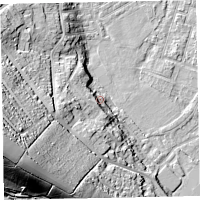 Shaded relief map of the ground around EX29DL, computed from Environment Agency LiDAR. The ground here sits at about 12 m above sea level and falls 54 m across the surrounding 800 m. Surface water reaching this point runs off ground lying to the west-south-west, 15.6 m higher.