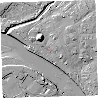 Shaded relief map of the ground around EX311DP, computed from Environment Agency LiDAR. The ground here sits at about 7 m above sea level and falls 21 m across the surrounding 800 m. Surface water reaching this point runs off ground lying to the north-west, 16.2 m higher.