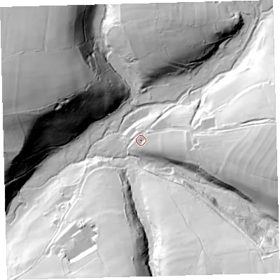 Shaded relief map of the ground around EX314TS, computed from Environment Agency LiDAR. The ground here sits at about 253 m above sea level and falls 71 m across the surrounding 800 m. Surface water reaching this point runs off ground lying to the east, 18.8 m higher.