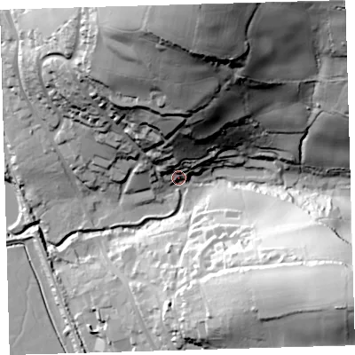 Shaded relief map of the ground around EX320BQ, computed from Environment Agency LiDAR. The ground here sits at about 11 m above sea level and falls 87 m across the surrounding 800 m. Surface water reaching this point runs off ground lying to the north, 83.5 m higher.