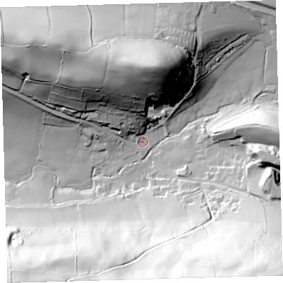 Shaded relief map of the ground around EX320PF, computed from Environment Agency LiDAR. The ground here sits at about 49 m above sea level and falls 102 m across the surrounding 800 m. Surface water reaching this point runs off ground lying to the north, 63.4 m higher.