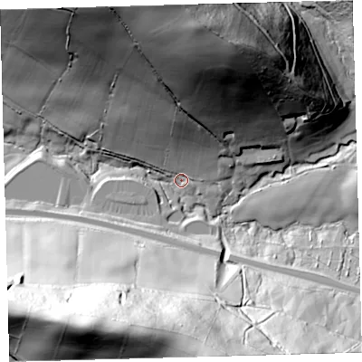 Shaded relief map of the ground around EX320QX, computed from Environment Agency LiDAR. The ground here sits at about 69 m above sea level and falls 83 m across the surrounding 800 m. Surface water reaching this point runs off ground lying to the south, 77.7 m higher.