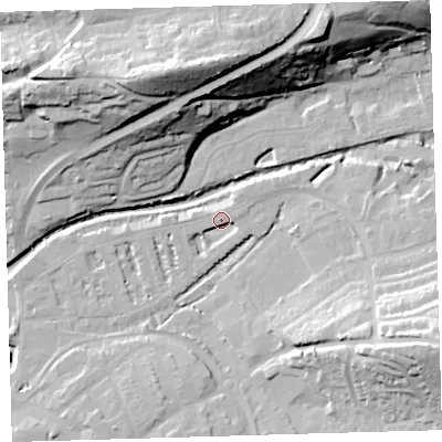 Shaded relief map of the ground around EX327AN, computed from Environment Agency LiDAR. The ground here sits at about 7 m above sea level and falls 42 m across the surrounding 800 m. Surface water reaching this point runs off ground lying to the east-north-east, 3.2 m higher.
